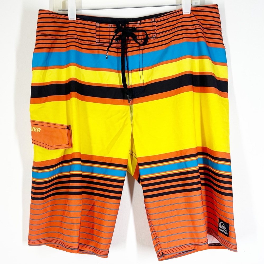 QUICKSILVER yellow and orange mens board shorts EUC SIZE 34